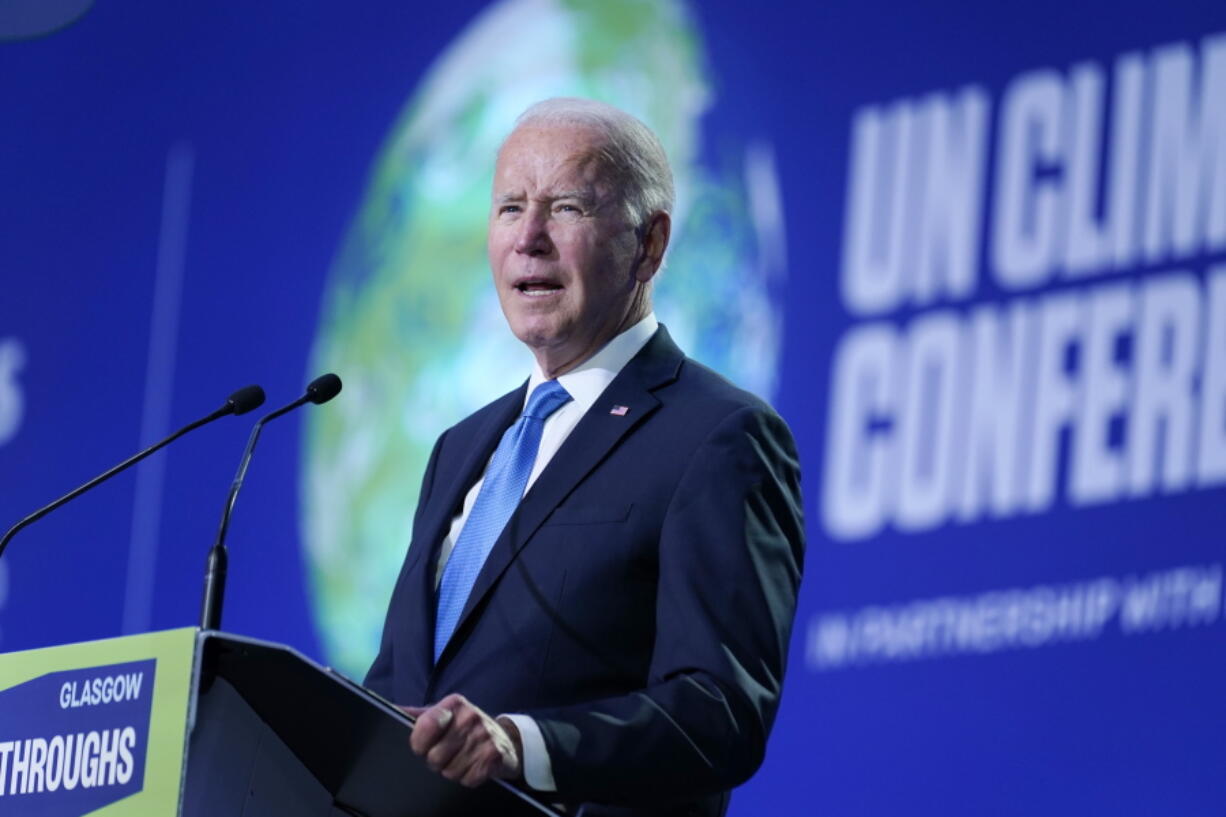 FILE - President Joe Biden speaks during the "Accelerating Clean Technology Innovation and Deployment" event at the COP26 U.N. Climate Summit, Nov. 2, 2021, in Glasgow, Scotland.  A federal appeals court has revived a Biden administration effort to put greater emphasis on potential damage from greenhouse gas emissions when creating rules for polluting industries. A Louisiana-based federal judge had blocked the so-called "social cost of carbon" policy last month, saying it would bring costly regulatory burdens and drive up energy costs.