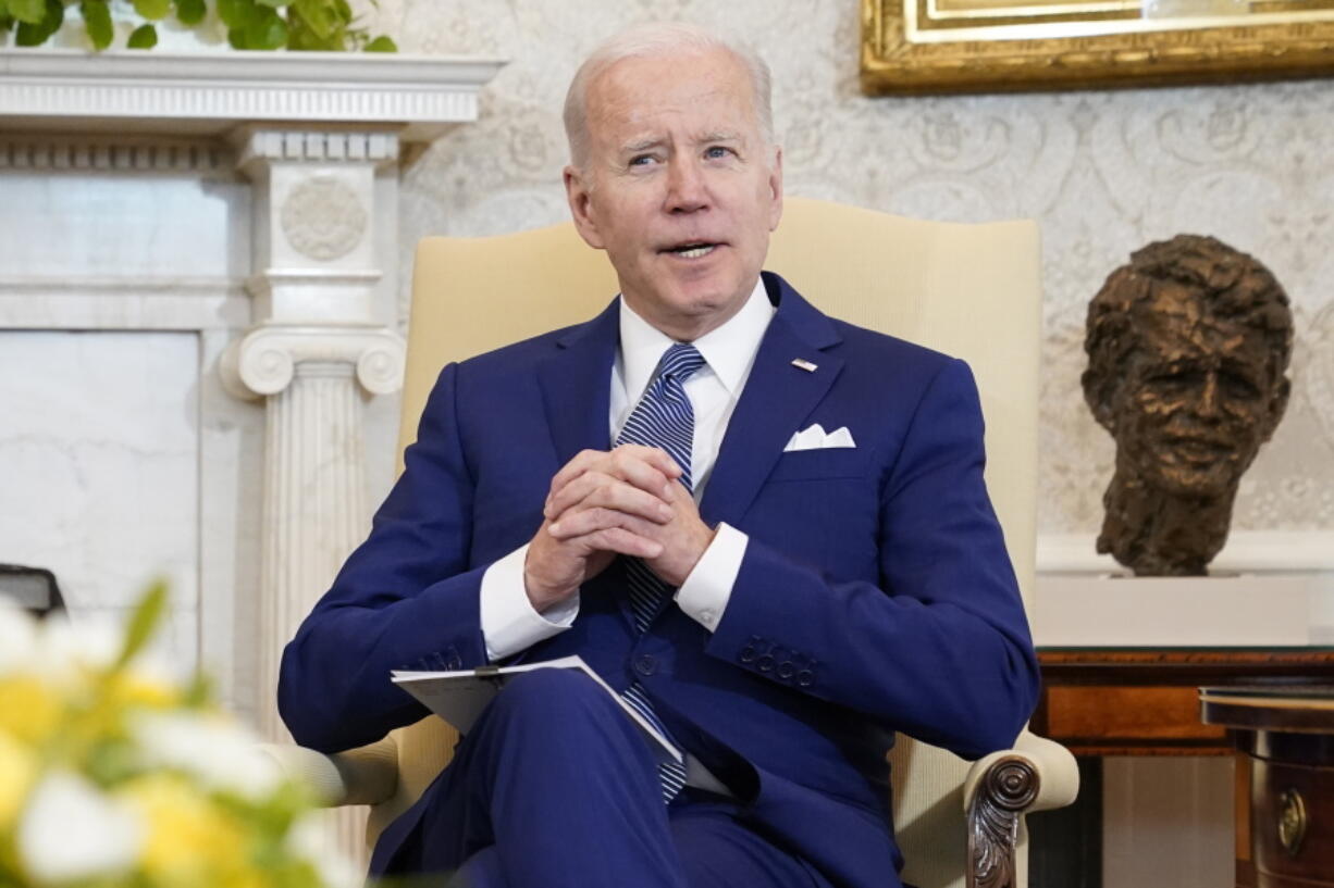 FILE - President Joe Biden sits in the Oval Office of the White House, on March 4, 2022, in Washington. Biden's trip on Tuesday to Fort Worth, Texas, is personal. It's a chance to talk with veterans and their caregivers and push for more help for members of the military who face health problems after exposure to burn pits.