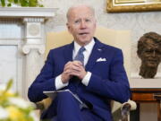 FILE - President Joe Biden sits in the Oval Office of the White House, on March 4, 2022, in Washington. Biden's trip on Tuesday to Fort Worth, Texas, is personal. It's a chance to talk with veterans and their caregivers and push for more help for members of the military who face health problems after exposure to burn pits.