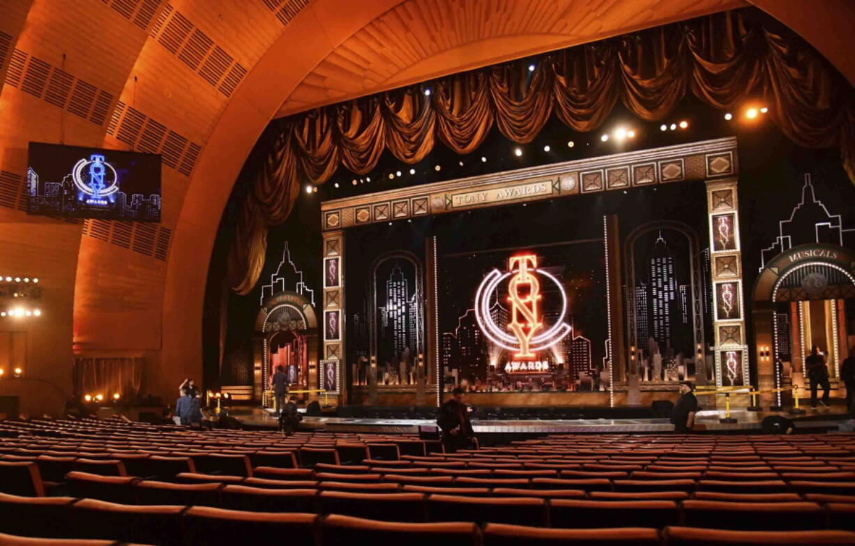 FILE - A decorated stage appears prior to the 73rd annual Tony Awards at Radio City Music Hall in New York on June 9, 2019. The Broadway League and the American Theatre Wing announced Wednesday that the Tony Awards will be held at Radio City Music Hall on June 12 and aired on CBS. Instead of a three-hour presentation, producers are adding an extra hour ahead of the telecast that will stream only on Paramount+.