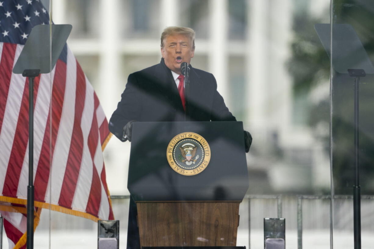 FILE - President Donald Trump speaks during a rally protesting the electoral college certification of Joe Biden as President in Washington, Jan. 6, 2021. On the day of the Capitol riot that shook American democracy, there are no official White House phone notations from about 11 a.m. to about 7 p.m. While that leaves holes in the record, a lot of publicly available information has surfaced about what Trump did do and say.