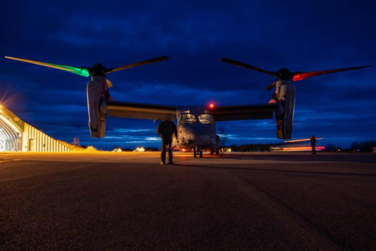 U.S. Marines inspect a MV-22B Osprey prior to flight at Norwegian Air Force Base Bodo during Exercise Cold Response 22, Norway, March 16, 2022.  Four U.S. Marines were killed when their Osprey aircraft crashed in a Norwegian town in the Arctic Circle during a NATO exercise unrelated to Russia's war in Ukraine, authorities said Saturday, March 19. Norwegian Prime Minister Jonas Gahr Stoere tweeted that they died in the crash on Friday night. The cause was under investigation, but Norwegian police reported bad weather in the area.(Lance Cpl. Elias E. Pimentel III/U.S.