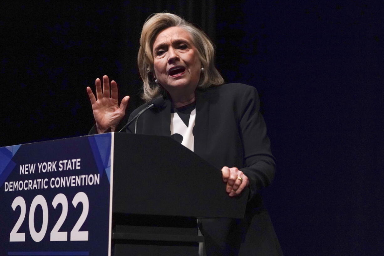 FILE -Hillary Rodham Clinton speaks during the New York State Democratic Convention in New York, Thursday, Feb. 17, 2022. Hillary Clinton's 2016 presidential campaign and the Democratic National Committee have agreed to pay $113,000 to settle a Federal Election Commission investigation into whether they violated campaign finance law by misreporting spending on research that eventually became the infamous Steele dossier.