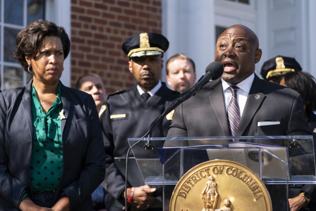 Washington Mayor Muriel Bowser, left, and Washington Metropolitan Police Chief Robert Contee III, center, stand as Alcohol, Tobacco and Firearms Special in Charge of the Washington Field Division Charlie Patterson, speaks during a news conference about the arrest of suspect in a recent string of attacks on homeless people, Tuesday, March 15, 2022, in Washington. A gunman suspected of stalking homeless people asleep on the streets of New York City and Washington, killing at least two people and wounding three others, was arrested early Tuesday, police said.