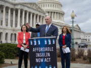 From left, Rep. Angie Craig, D-Minn., House Majority Whip James Clyburn, D-S.C., Rep. Dan Kildee, D-Mich., Rep. Lucy McBath, Ga., talk about their legislation aimed at capping the price of insulin, at the Capitol in Washington, Thursday, March 31, 2022. The bill would keep consumers' out-of-pocket costs at no more than $35 per month. (AP Photo/J.