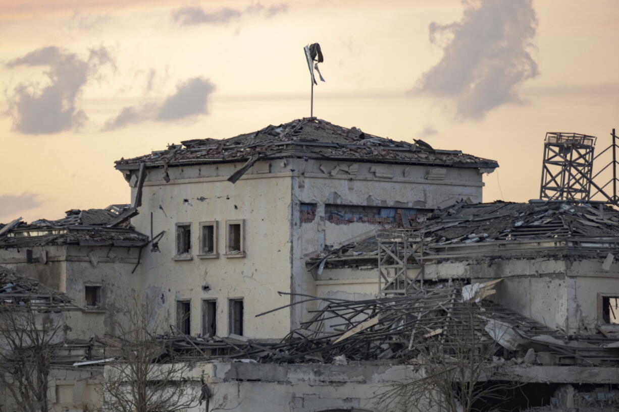 FILE - A house damaged by an Iranian ballistic missile attack is seen in Irbil, Iraq, March 13, 2022. Iran has claimed responsibility for a missile barrage that struck early Sunday near a sprawling U.S. consulate complex in the northern Iraqi city of Irbil, saying it was retaliation for an Israeli strike in Syria that killed two members of its Revolutionary Guard.