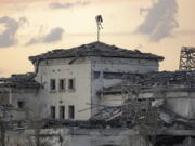 FILE - A house damaged by an Iranian ballistic missile attack is seen in Irbil, Iraq, March 13, 2022. Iran has claimed responsibility for a missile barrage that struck early Sunday near a sprawling U.S. consulate complex in the northern Iraqi city of Irbil, saying it was retaliation for an Israeli strike in Syria that killed two members of its Revolutionary Guard.