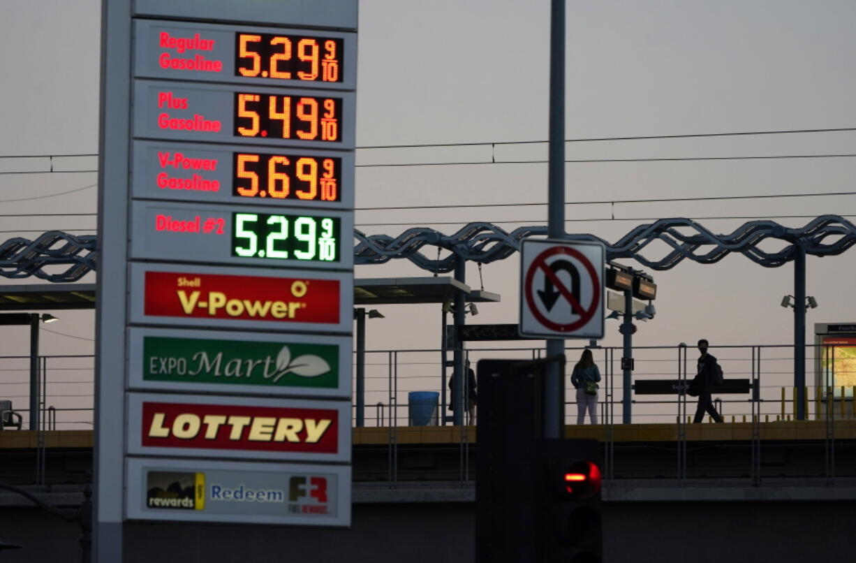 Gas prices are advertised at over five dollars a gallon, Feb. 28, 2022, in Los Angeles. Gasoline prices are rising again as talk grows about the United States banning imports of oil from Russia to punish the country for invading Ukraine. The national average price, Monday, March 7, 2022, jumped above $4.06 a gallon. Auto club AAA says that's the highest price that American motorists have faced since July 2008.