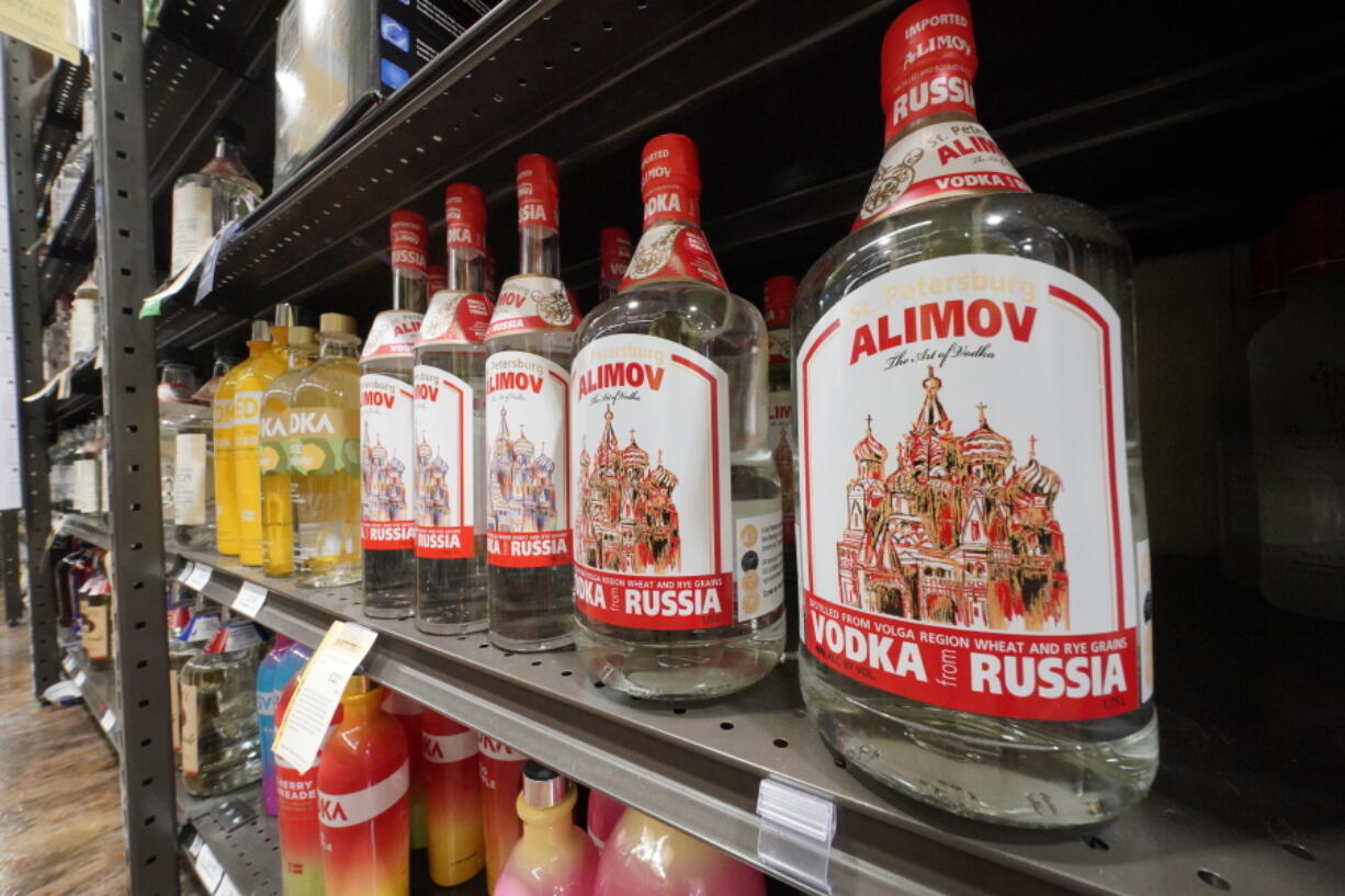 FILE - This is a display of Alimov Vodka, from Russia, in a Total Wine and More store in University Park, Fla., on Sunday, Feb. 27, 2022. In escalating the U.S. drive to squeeze Russia's economy, President Joe Biden moved Friday, March 11, with European and other key allies, to revoke Moscow's "most favored nation" trade status. His administration also banned imports of Russian seafood, alcohol and diamonds. (AP Photo/Gene J.