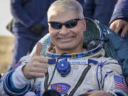 NASA astronaut Mark Vande Hei gives the thumbs up outside the Soyuz MS-19 spacecraft after he landed with Russian cosmonauts Anton Shkaplerov and Pyotr Dubrov in a remote area near the town of Zhezkazgan, Kazakhstan on Wednesday, March 30, 2022. Vande Hei and Dubrov are returning to Earth after logging 355 days in space as members of Expeditions 64-66 aboard the International Space Station.