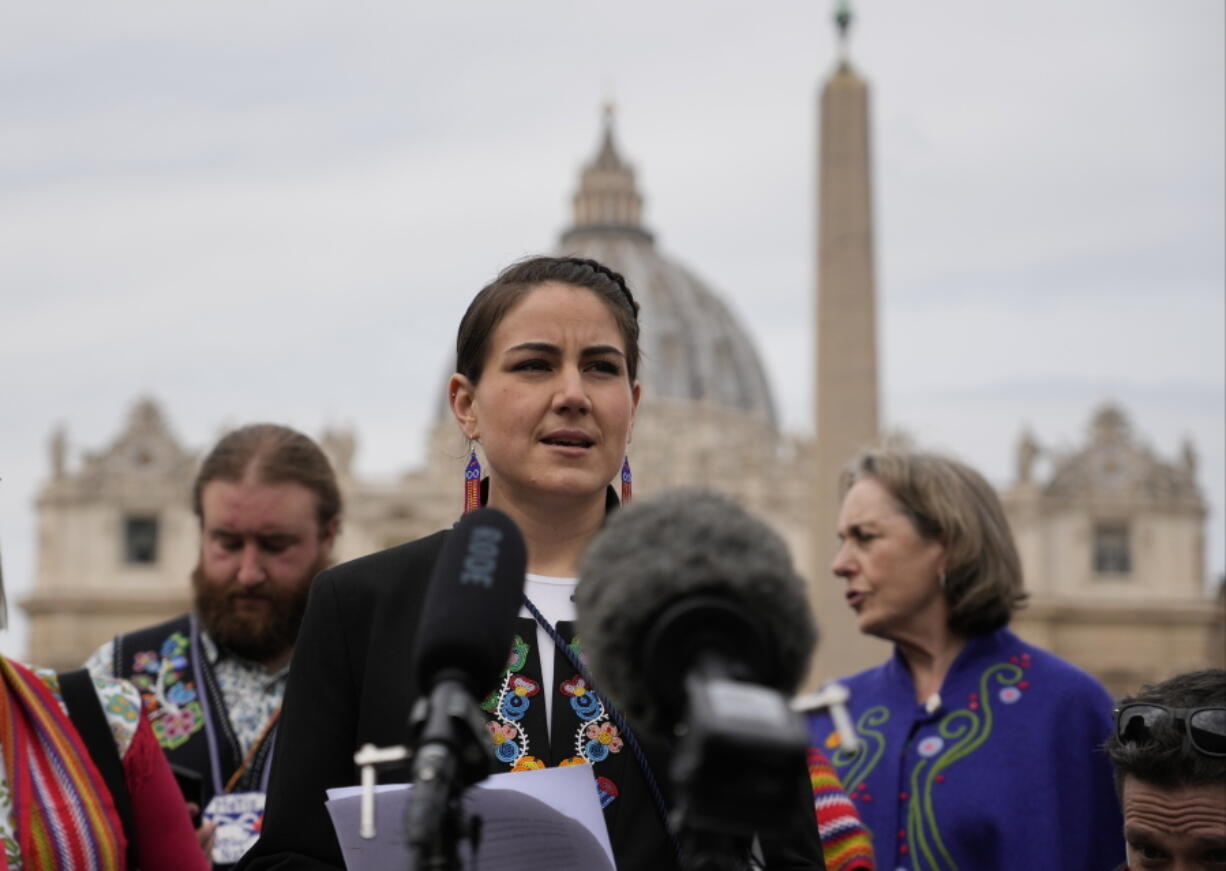 President of the Metis community, Cassidy Caron, speaks to the media in St. Peter's Square after their meeting with Pope Francis at The Vatican, Monday, March 28, 2022.