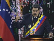 FILE - Venezuelan President Nicolas Maduro speaks during a ceremony marking the start of the judicial year at the Supreme Court in Caracas, Venezuela, Jan. 27, 2022. Maduro signaled an interest in improving relations with the U.S. following talks with high-level American officials prompted in part by Russia's invasion of Ukraine and concerns of rising gas prices in the U.S., in a televised meeting with cabinet members late Monday, March 7, 2022, but did not provide details of the discussions.