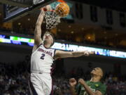 Gonzaga forward Drew Timme (2) shoots against San Francisco forward Patrick Tape (11) during the first half of West Coast Conference semifinal game on Monday.