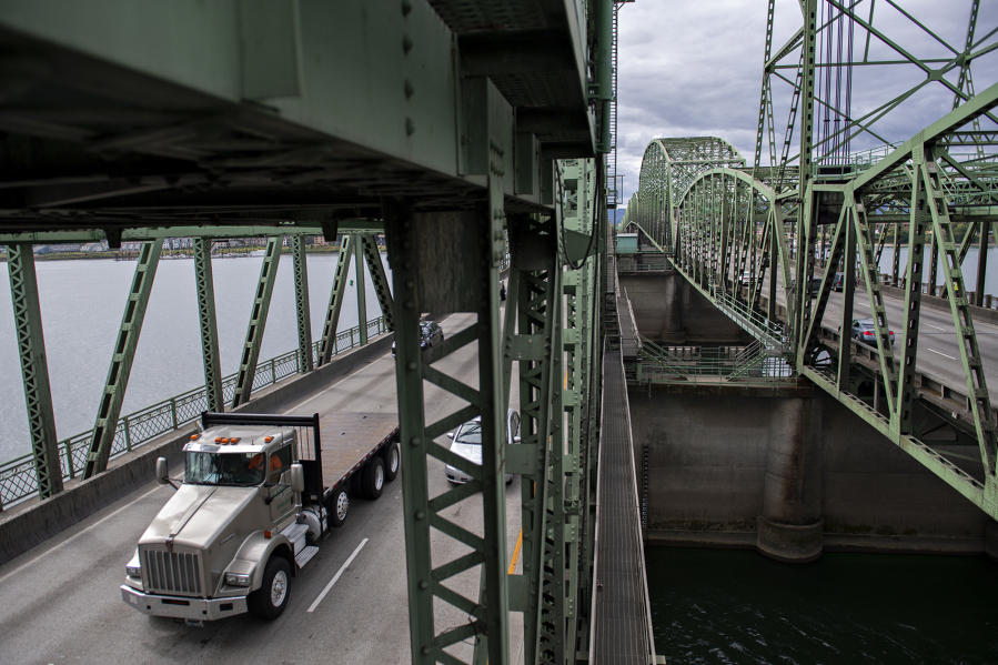 A truck driver travels northbound on the Interstate 5 Bridge in August 2021. Washington's hefty bill, Move Ahead Washington, secured $1 billion in funding for the I-5 Bridge replacement project.