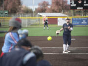 Seton Catholic's Katy Kutch fires a pitch against Mark Morris on Thursday at Fort Vancouver High School.