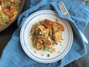 White quinoa stands in for breadcrumbs in these savoy, garlicky chicken meatballs served with roasted carrots.