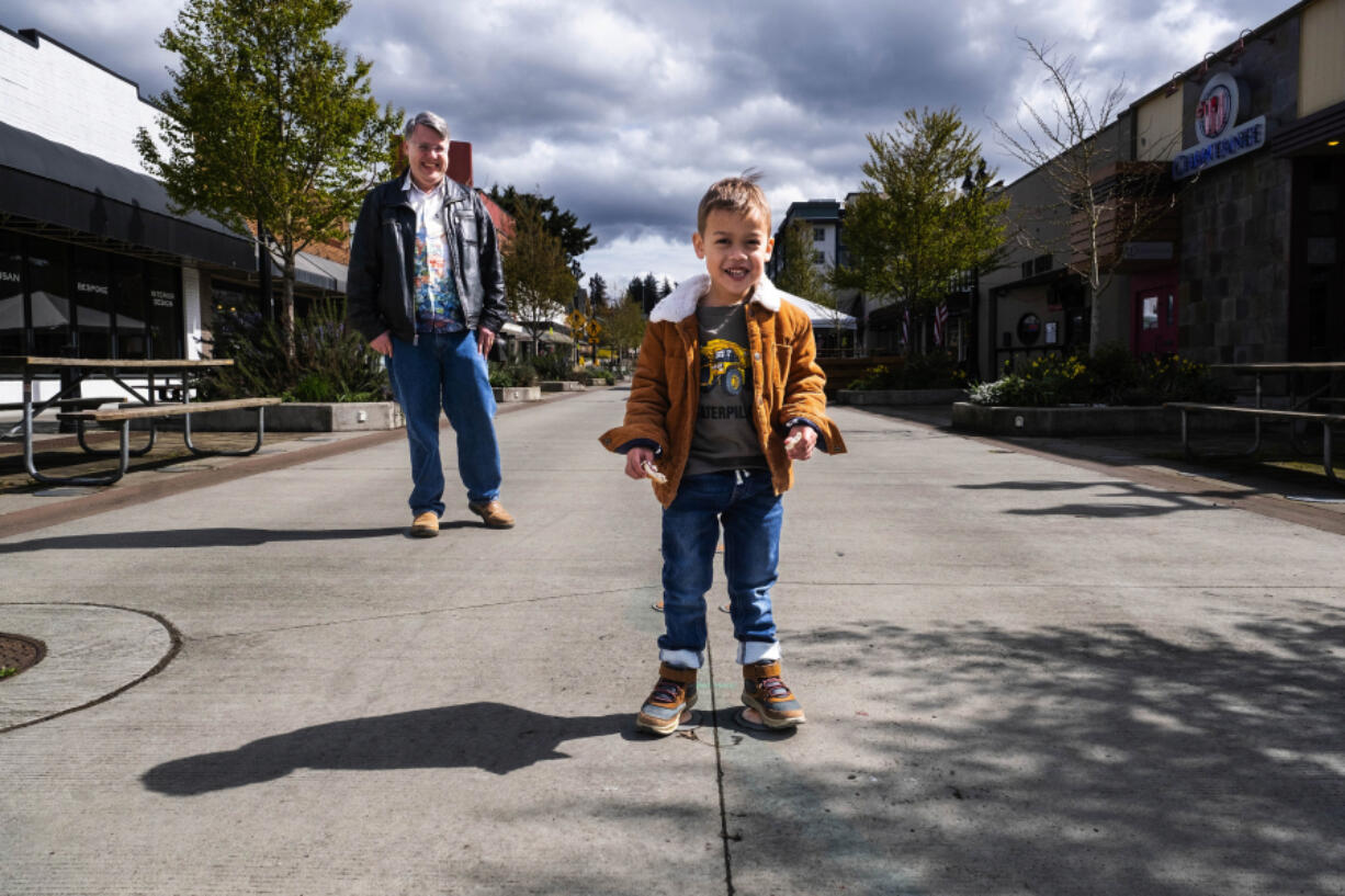 Odin Eisenberg is particularly fond of playing in the middle of the street -- and that's okay by his father, Eric, background -- so long as it's in downtown Bothell, Washington, where a block-long stretch of Main Street has been closed since the beginning of the coronavirus pandemic. Bothell's City Council just voted to extend that closure an additional two years and is considering making that closure permanent.