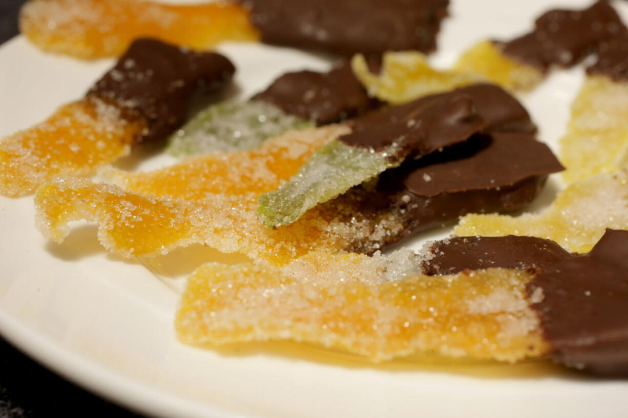 Candied Citrus Fruit Peels dipped in chocolate, Wednesday, March 23, 2022. (Hillary Levin/St.