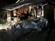 The garage of a house caught fire Monday night in the 8700 block of Northeast 76th Avenue. Smoke detectors woke the residents, and they were able to escape before firefighters arrived.