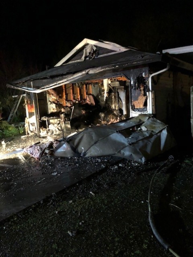 The garage of a house caught fire Monday night in the 8700 block of Northeast 76th Avenue. Smoke detectors woke the residents, and they were able to escape before firefighters arrived.