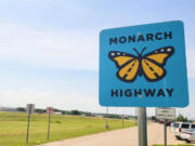 A road sign marks the Monarch Highway corridor near Abbott, Texas. Energy and transportation companies as well as some state and local governments across 23 states have voluntarily agreed to increase monarch habitat conservation.