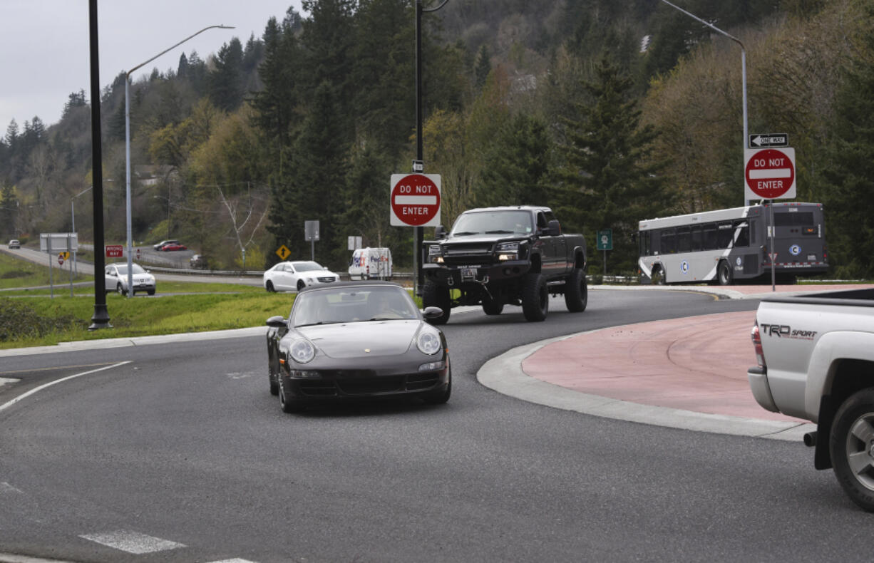 Traffic coming from SR-14 west enters the roundabout at northwest 6th Avenue in Camas, Friday afternoon, March 30, 2018.