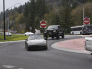 Traffic coming from SR-14 west enters the roundabout at northwest 6th Avenue in Camas, Friday afternoon, March 30, 2018.