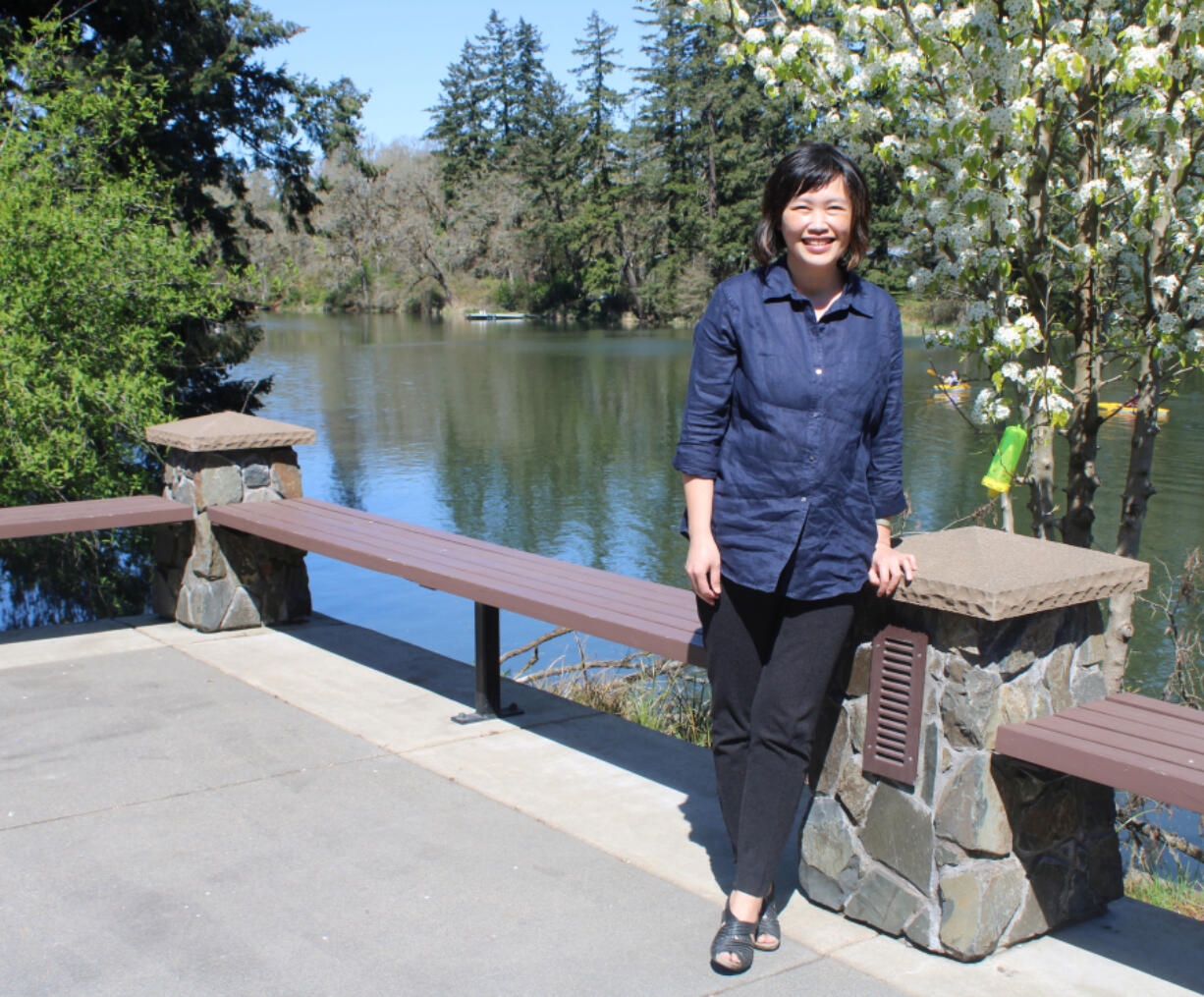 Camas Parks and Recreation Director Trang Lam stands outside the city-owned Lacamas Lake Lodge, overlooking Lacamas Lake, on Monday, April 12, 2021.