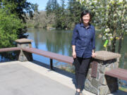 Camas Parks and Recreation Director Trang Lam stands outside the city-owned Lacamas Lake Lodge, overlooking Lacamas Lake, on Monday, April 12, 2021.