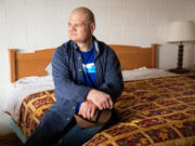 Jason Young inside his hotel room at San Juan Motel in Anacortes on Friday, March 25, 2022. Young was accused of stealing bicycles from the Port of Friday Harbor in 2019, based largely on what a deputy said he saw in a security video. Two years later, the deputy said his original statement about what he saw in the video was inaccurate. Young said while the case dragged on, his business working on cars dried up because no one on San Juan Island wanted to hire an accused thief. He and his partner are now homeless.