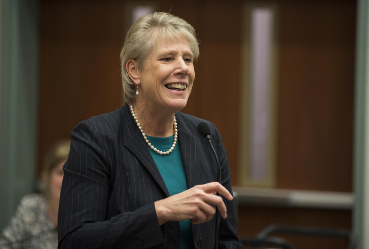 Councilor Julie Olson thanks her supporters after taking the oath of office at the Clark County Public Service Center in Vancouver in 2018. She announced Monday that she will not seen an additional term on the Clark County Council.