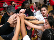 The Fort Vancouver girls basketball team huddles for a cheer during a timeout in a December nonleague contest against 1B Columbia Adventist. The Trappers went 2-15 last winter playing a modified schedule of league and independent opponents. The girls soccer program also played a modified schedule of subvarsity opponents and varsity opponents in lower classifications.