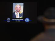 Law enforcement officials pay tribute to Officer Donal Sahota during a memorial service at ilani Casino Resort near La Center on Tuesday afternoon, Feb. 8, 2022.