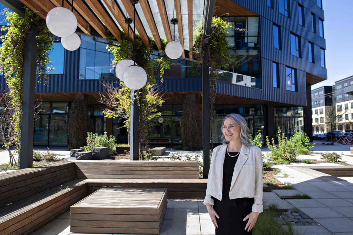 Executive Director Elizabeth Higley takes a break outside of Great Life Mentoring's new office space in Portland on Thursday. Great Life Mentoring, a former program of Columbia River Mental Health Services that provides mental health services for children living in poverty, is transitioning into becoming a standalone nonprofit thanks to grants from the Community Foundation for Southwest Washington and others.