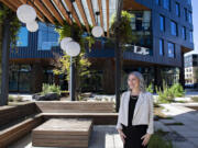 Executive Director Elizabeth Higley takes a break outside of Great Life Mentoring's new office space in Portland on Thursday. Great Life Mentoring, a former program of Columbia River Mental Health Services that provides mental health services for children living in poverty, is transitioning into becoming a standalone nonprofit thanks to grants from the Community Foundation for Southwest Washington and others.