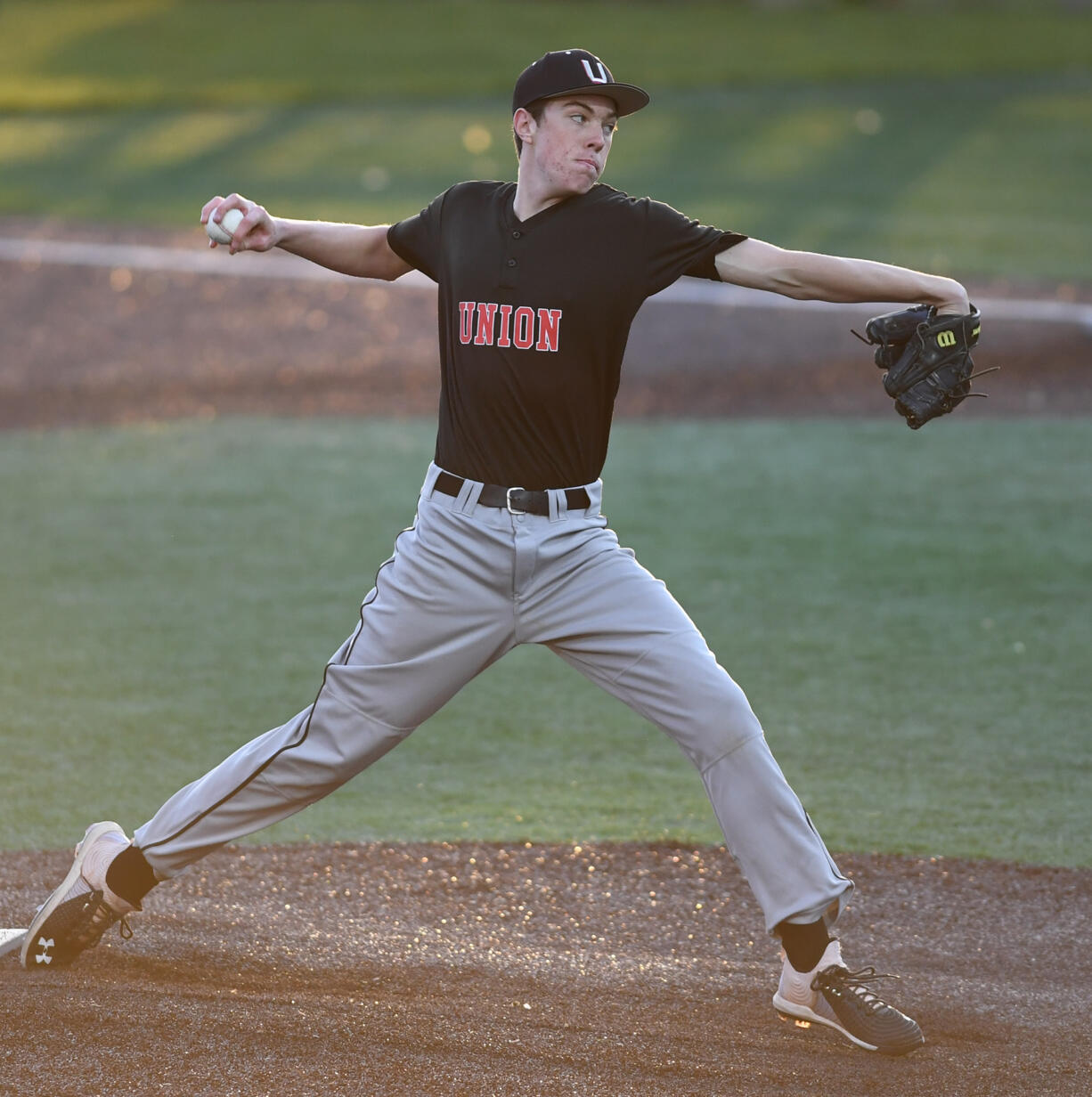 Union junior Evan McGuire throws the ball Wednesday, April 13, 2022, during the Titans’ 6-3 win against the Storm at Propstra Stadium.