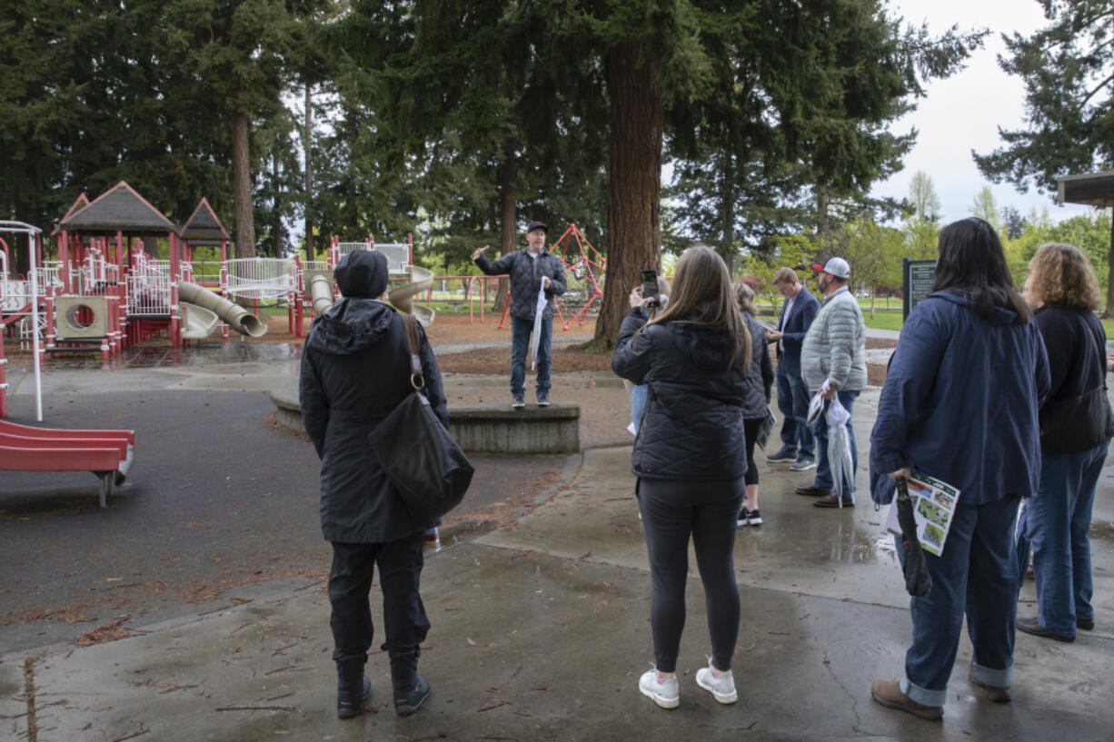 Cody Goldberg, executive director of Harper's Playground, shares plans for a fully accessible playground on a tour at Marshall Park on Thursday. It will update and enhance the playground's current firefighter theme.