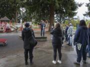 Cody Goldberg, executive director of Harper's Playground, shares plans for a fully accessible playground on a tour at Marshall Park on Thursday. It will update and enhance the playground's current firefighter theme.