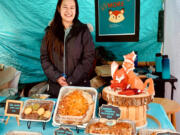 Elizabeth Sebastian of Little Miss Baketress sells butter mochi at the Vancouver Farmers Market.