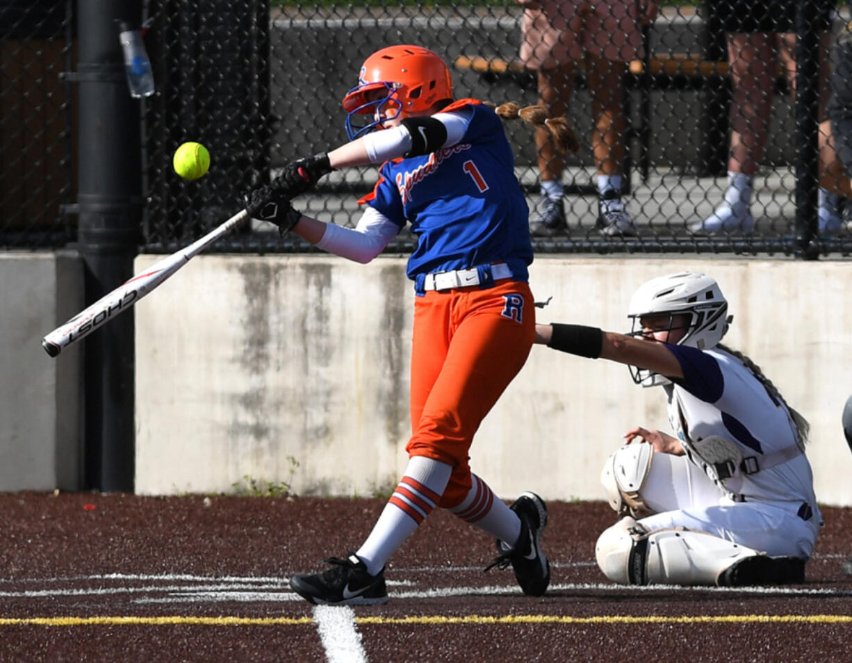 Ridgefield sophomore Mallory Vancleave hits the ball Friday, April 22, 2022, during the Spudders' 2-1 win against Columbia River at the Ridgefield Outdoor Recreation Complex.