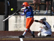 Ridgefield sophomore Mallory Vancleave hits the ball Friday, April 22, 2022, during the Spudders' 2-1 win against Columbia River at the Ridgefield Outdoor Recreation Complex.