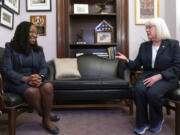 Supreme Court nominee Judge Ketanji Brown Jackson, left, listens as Sen. Patty Murray, D-Wash., right, speaks during a meeting in her office in Washington, Monday, March 14, 2022. Jackson's confirmation hearing starts March 21. If confirmed, she would be the court's first Black female justice.