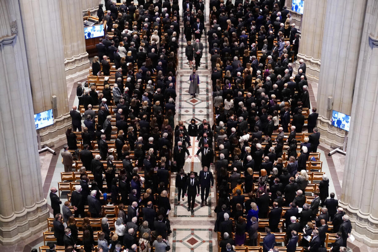 The escorted casket of former Secretary of State Madeleine Albright is taken out of the Washington National Cathedral, after a funeral service, Wednesday, April 27, 2022, in Washington.