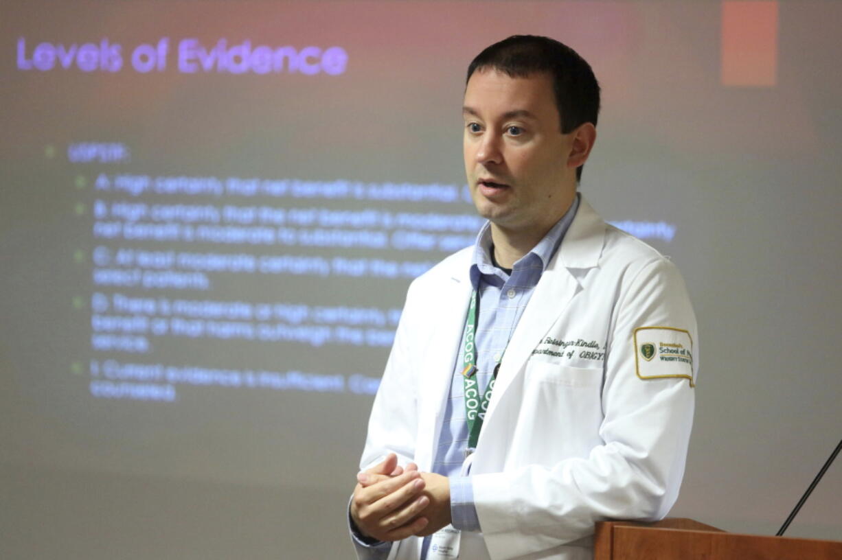 Dr. Keith Reisinger-Kindle, associate director of the OB-GYN residency program at Wright State University's medical school in Dayton, Ohio, leads a lecture of OB-GYN residents in the Wright State program Wednesday, April 13, 2022.