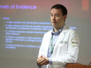 Dr. Keith Reisinger-Kindle, associate director of the OB-GYN residency program at Wright State University's medical school in Dayton, Ohio, leads a lecture of OB-GYN residents in the Wright State program Wednesday, April 13, 2022.