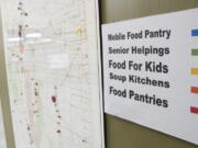 FILE - This June 21, 2013 image shows a map at Roadrunner Food Bank in Albuquerque, N.M., that depicts food distribution points across New Mexico. States with some of the nation's strictest abortion laws are also some of the hardest places to have and raise a healthy child, especially for the poor, according to an analysis of federal data by The Associated Press. A weaker safety net pattern isn't consistent for all measurements, with some Democratically controlled states, like New Mexico, that have less restrictive abortion laws also measuring poorly in some categories.