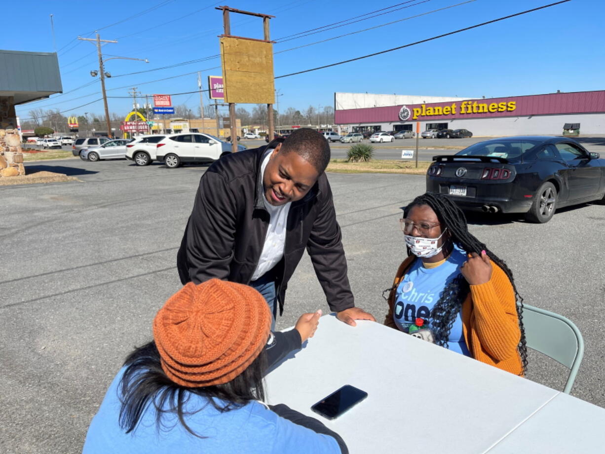 Democratic gubernatorial candidate Chris Jones speaks to campaign volunteers outside his campaign office in Pine Bluff, Ark. on Saturday, February 19, 2022.