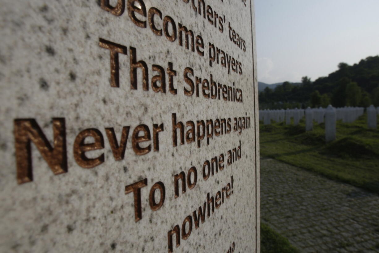 FILE - A gravestone in memory of victims of the Srebrenica massacre is seen at the Potocari memorial center near Srebrenica, Bosnia, Thursday, May 26, 2011. Survivors of war crimes committed during Bosnia's 1992-95 war say the victims of ongoing human rights abuses in Ukraine should learn from their experience of fighting for justice, but that they must first make peace with the fact that reaching it will inevitably be a lengthy and painful process.