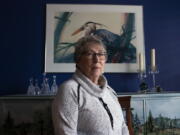 Joyce Ares sits for a portrait in the dinning room of her home March 18 in Canby, Ore.