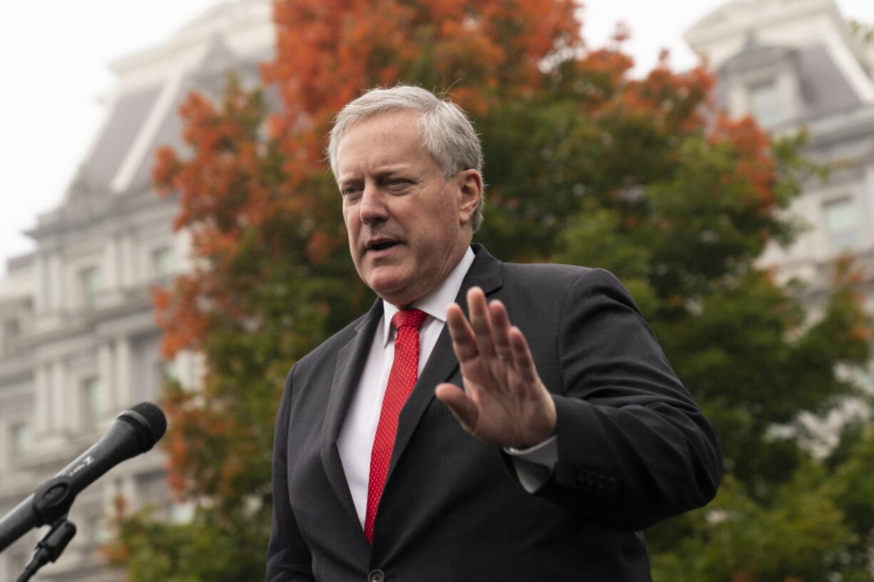 FILE - White House chief of staff Mark Meadows speaks with reporters at the White House, Wednesday, Oct. 21, 2020, in Washington. A former White House official told the House committee investigating the Jan. 6, 2021 insurrection at the U.S. Capitol that President Donald Trump's chief of staff, Mark Meadows, had been advised of intelligence reports showing the potential for violence that day, according to transcripts released late Friday night, April 22, 2022.